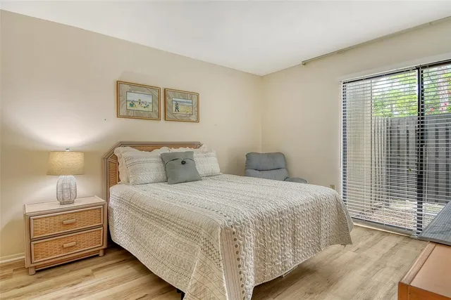 a view of a lake with boats in front of house