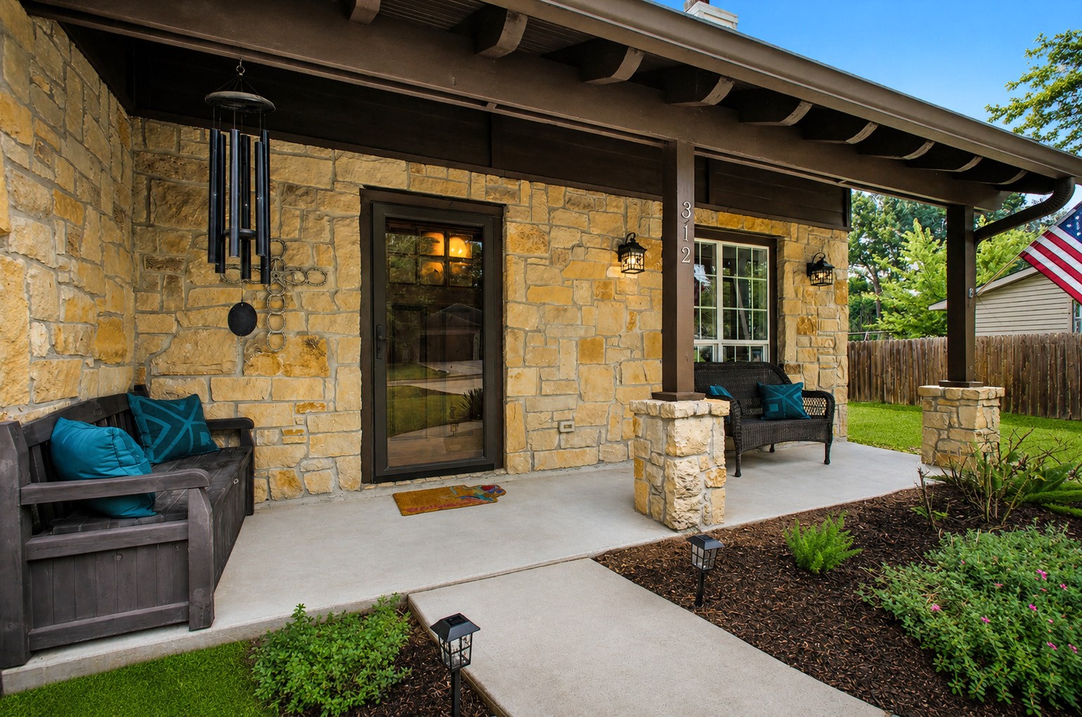 312 Springwood Drive Conroe, TX 77385 - Photo 7 of 50 Enjoy your morning coffee while relaxing under the cozy covered front porch.