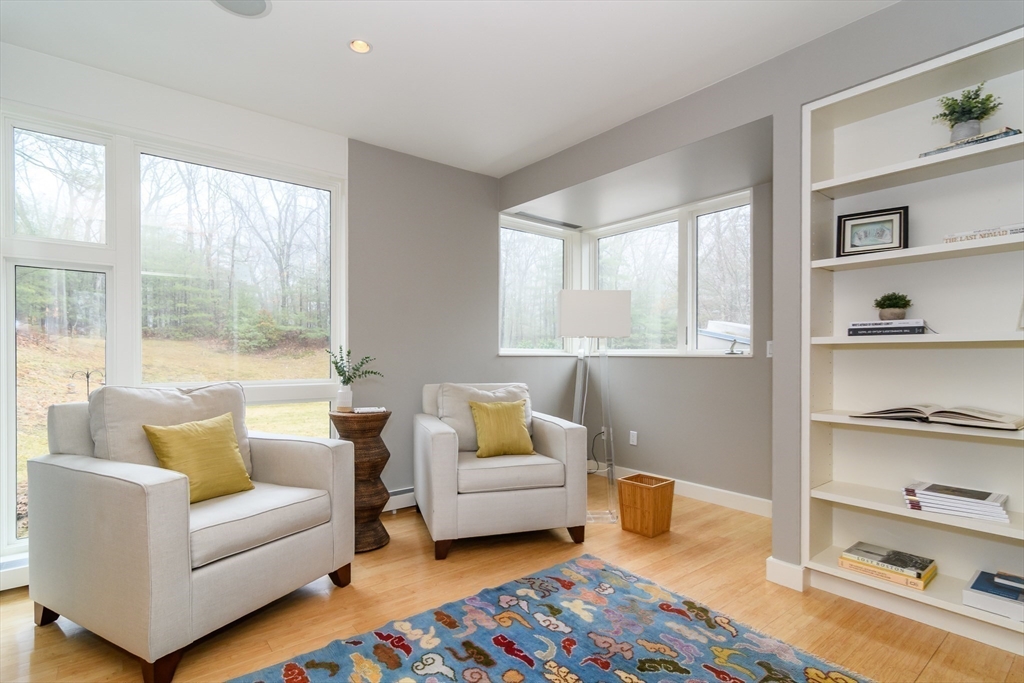 41 Grove Street Wayland, MA 01778 - Photo 17 of 24 a living room with furniture and a window