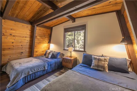 a room with furniture and wooden floor