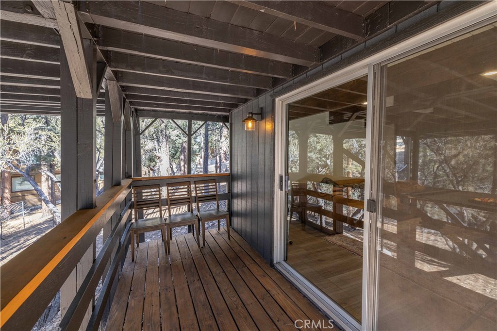 1107 Cedar Mountain Road Big Bear City, CA 92314 - Photo 34 of 42 a view of a balcony with chairs