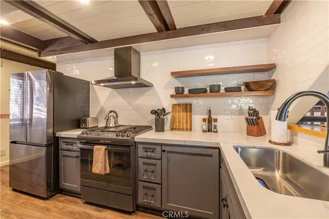 a view of balcony with wooden floor