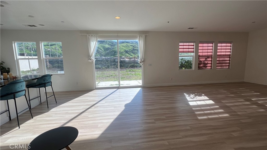 20349 Barrel Road Riverside, CA 92507 - Photo 16 of 21 a view of a room with wooden floor and windows