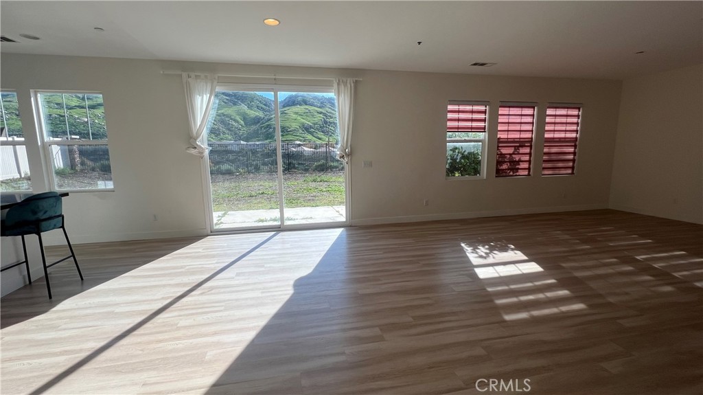 20349 Barrel Road Riverside, CA 92507 - Photo 17 of 21 a view of wooden floor and windows in a room