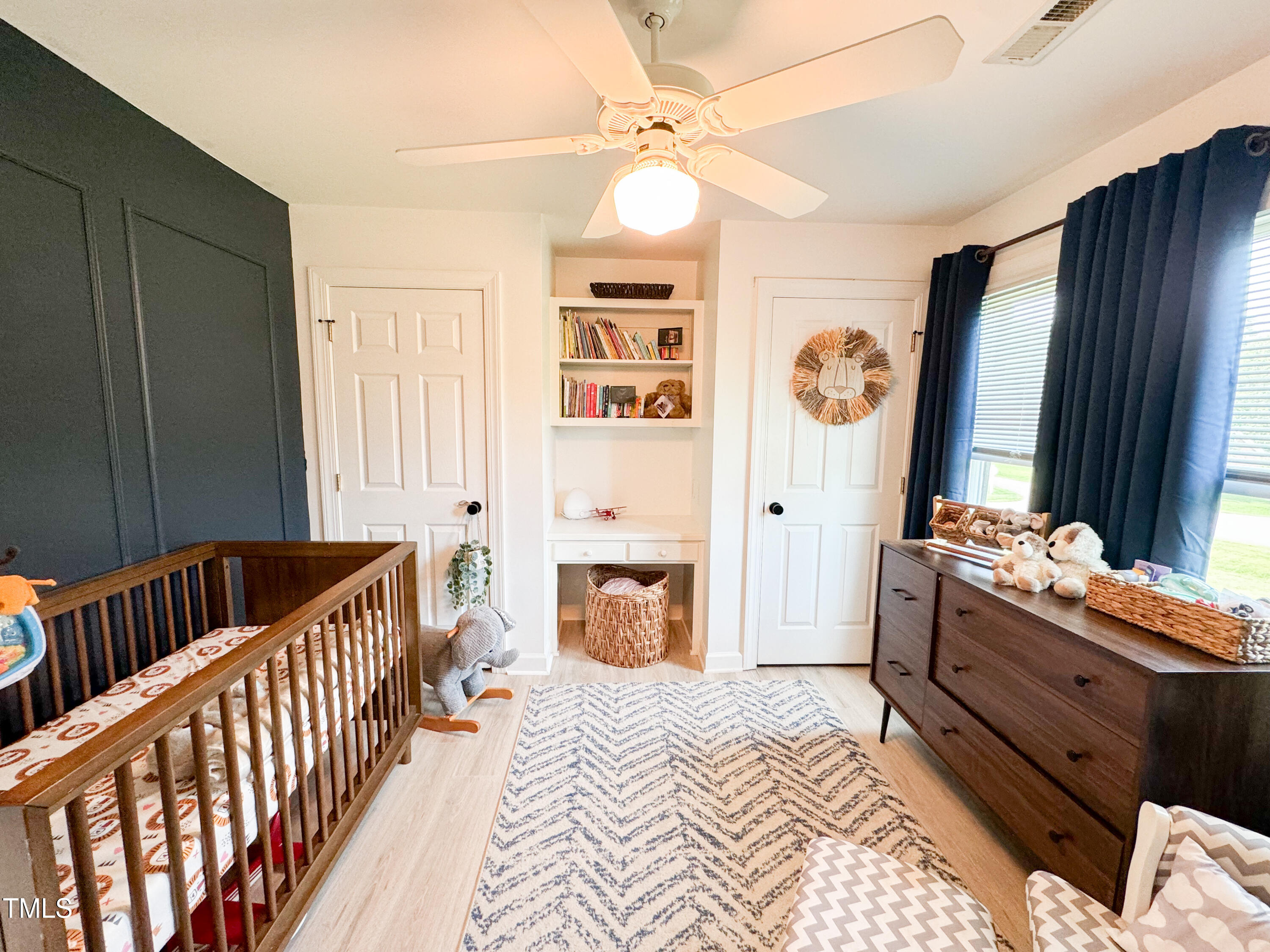 120 Denada Path Roxboro, NC 27574 - Photo 29 of 44 a bedroom with furniture and a fireplace