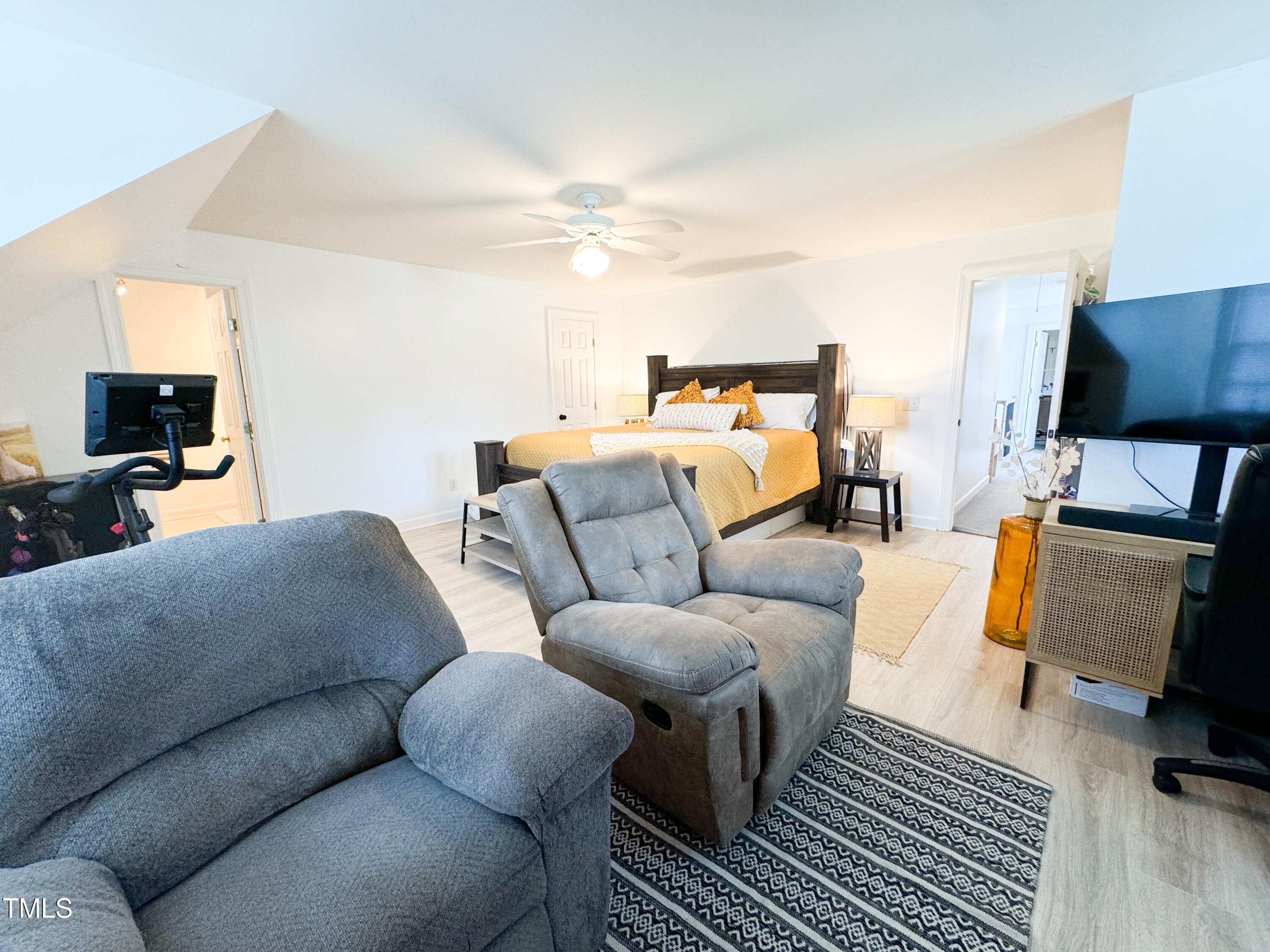 120 Denada Path Roxboro, NC 27574 - Photo 37 of 44 a living room with furniture and a flat screen tv