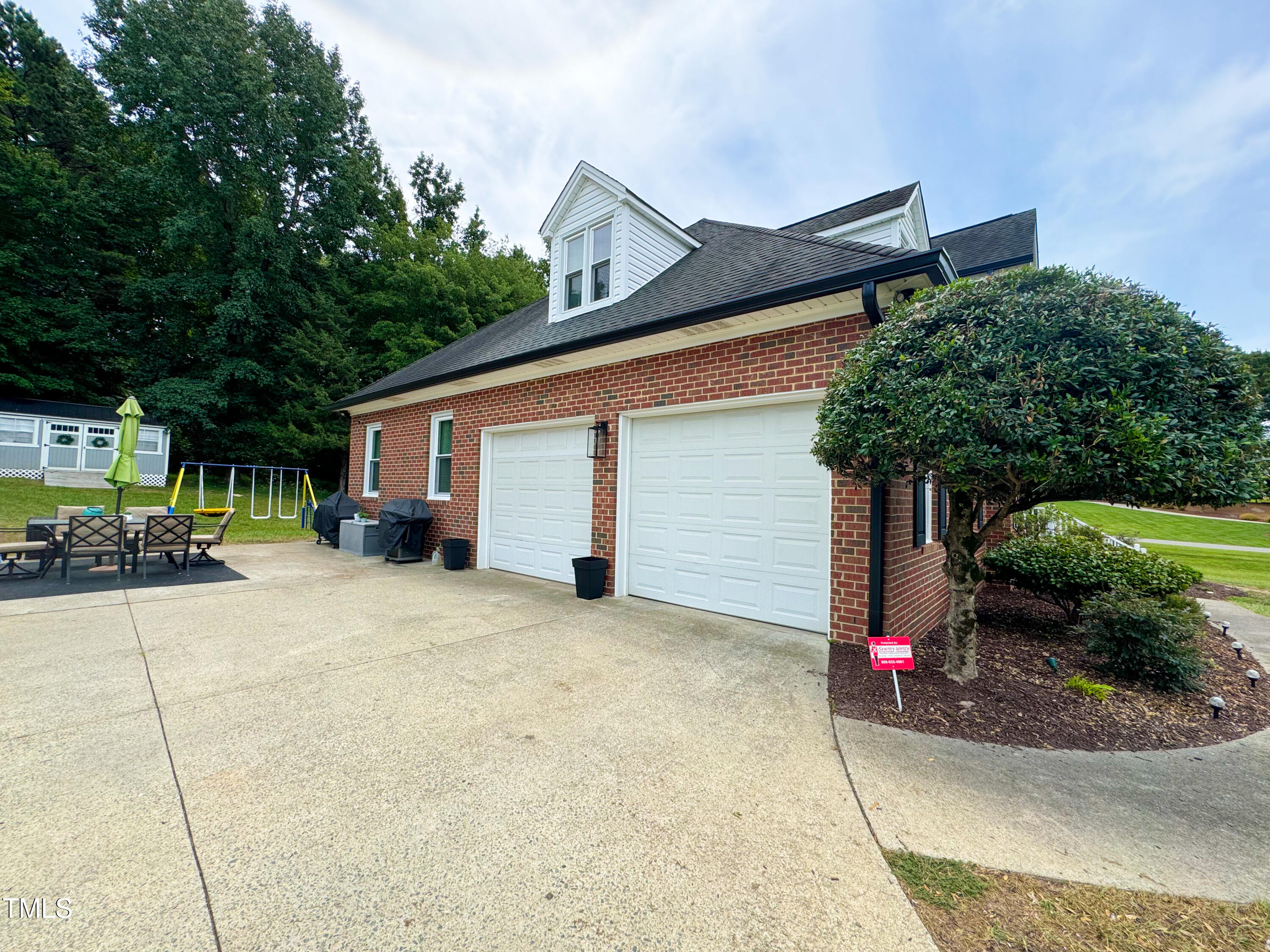 120 Denada Path Roxboro, NC 27574 - Photo 41 of 44 a view of a house with backyard and garden