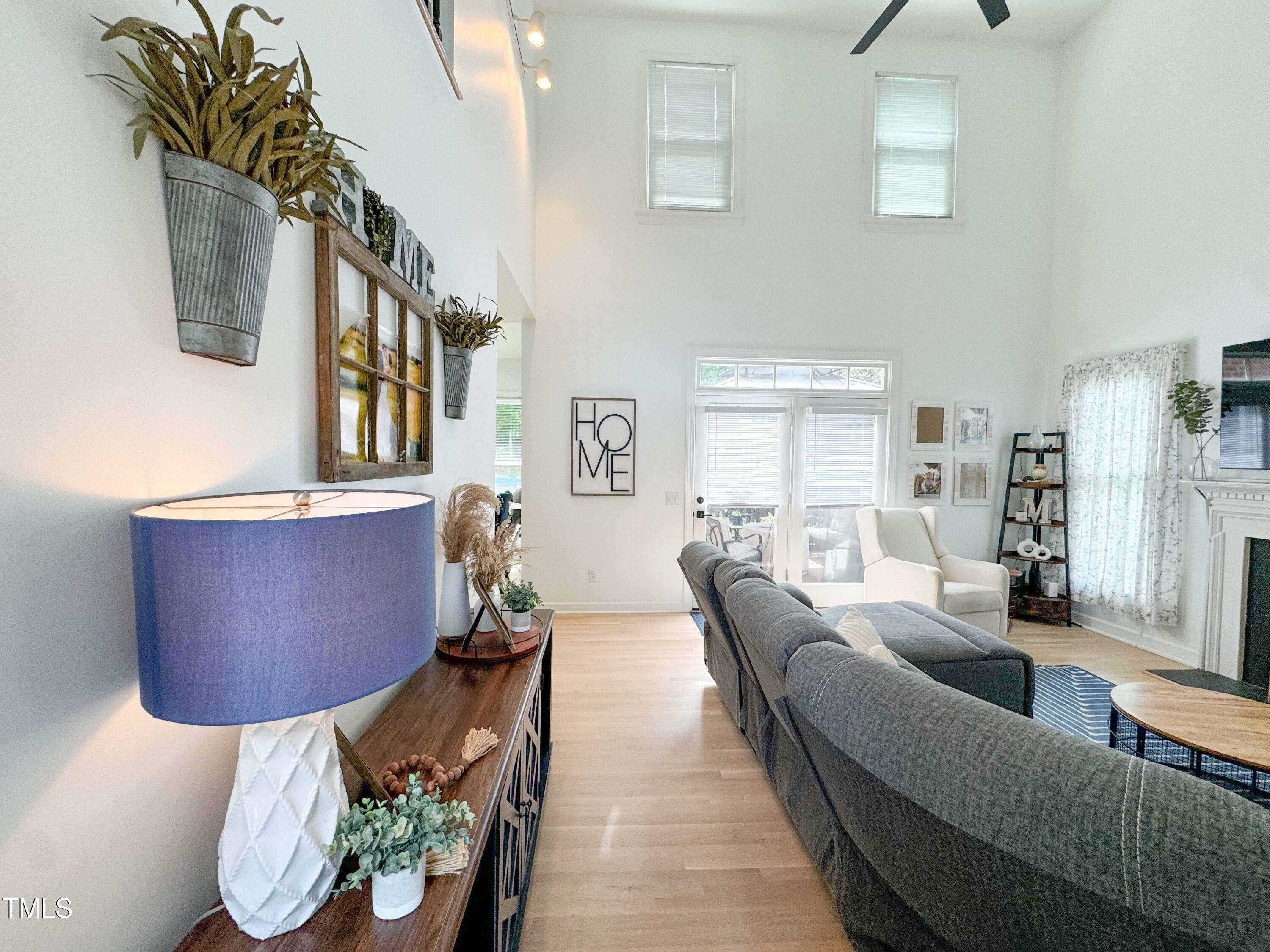 120 Denada Path Roxboro, NC 27574 - Photo 5 of 44 a living room with furniture and a potted plant