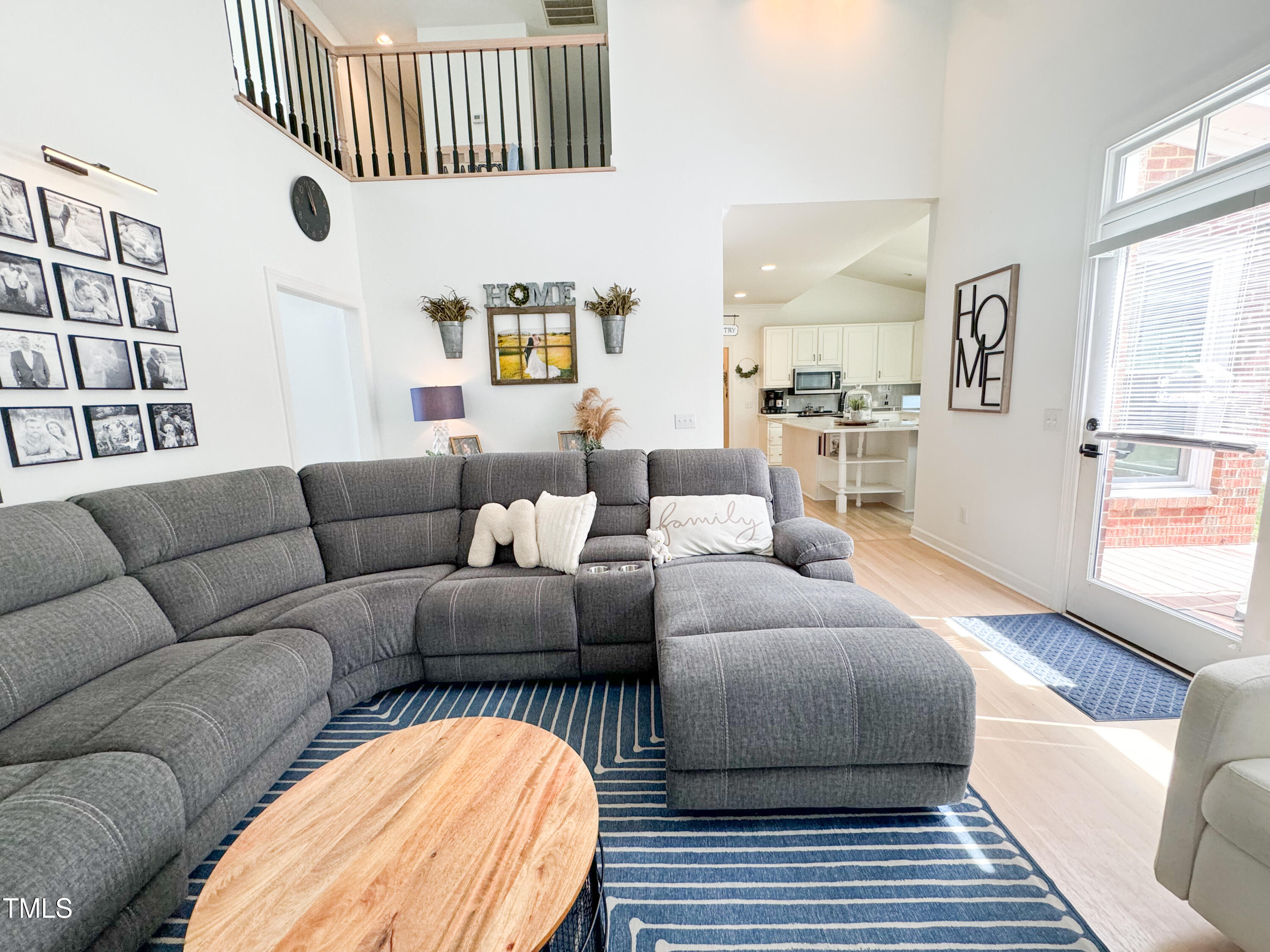 120 Denada Path Roxboro, NC 27574 - Photo 7 of 44 a living room with furniture a rug and a window