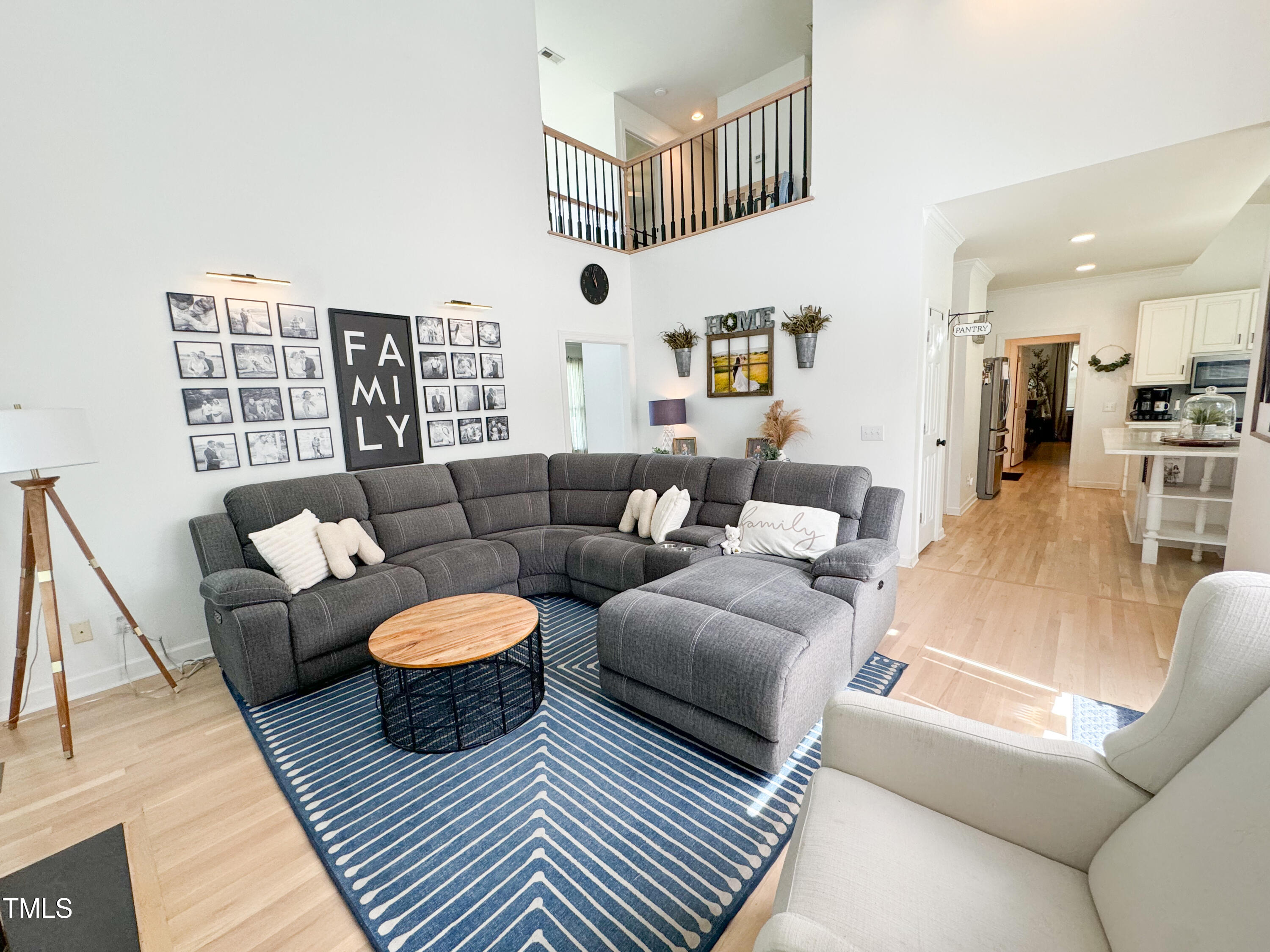 120 Denada Path Roxboro, NC 27574 - Photo 8 of 44 a living room with furniture and a large window