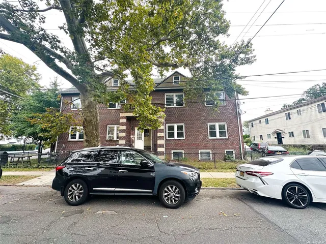 a car parked in front of a house