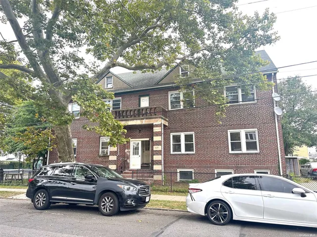 a car parked in front of a house