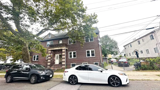 a car parked in front of a building