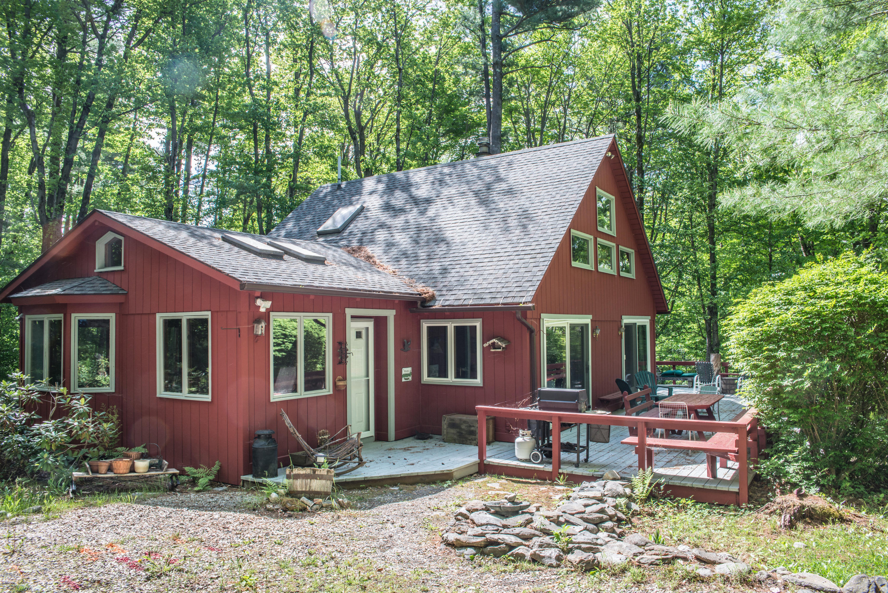 43 Path Road Tolland, MA 01034 - Photo 1 of 35 a front view of a house with garden