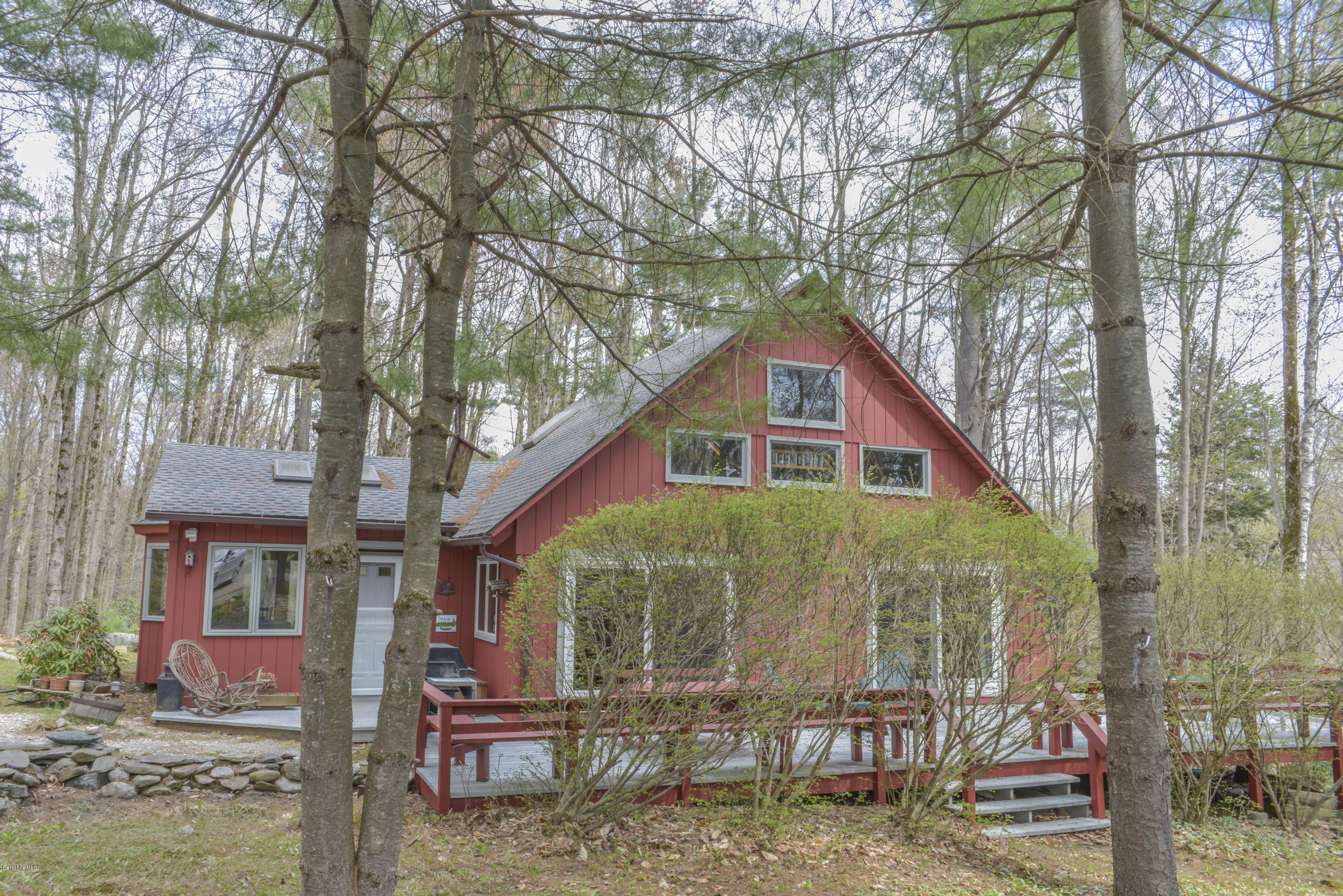43 Path Road Tolland, MA 01034 - Photo 2 of 35 a front view of a house with garden