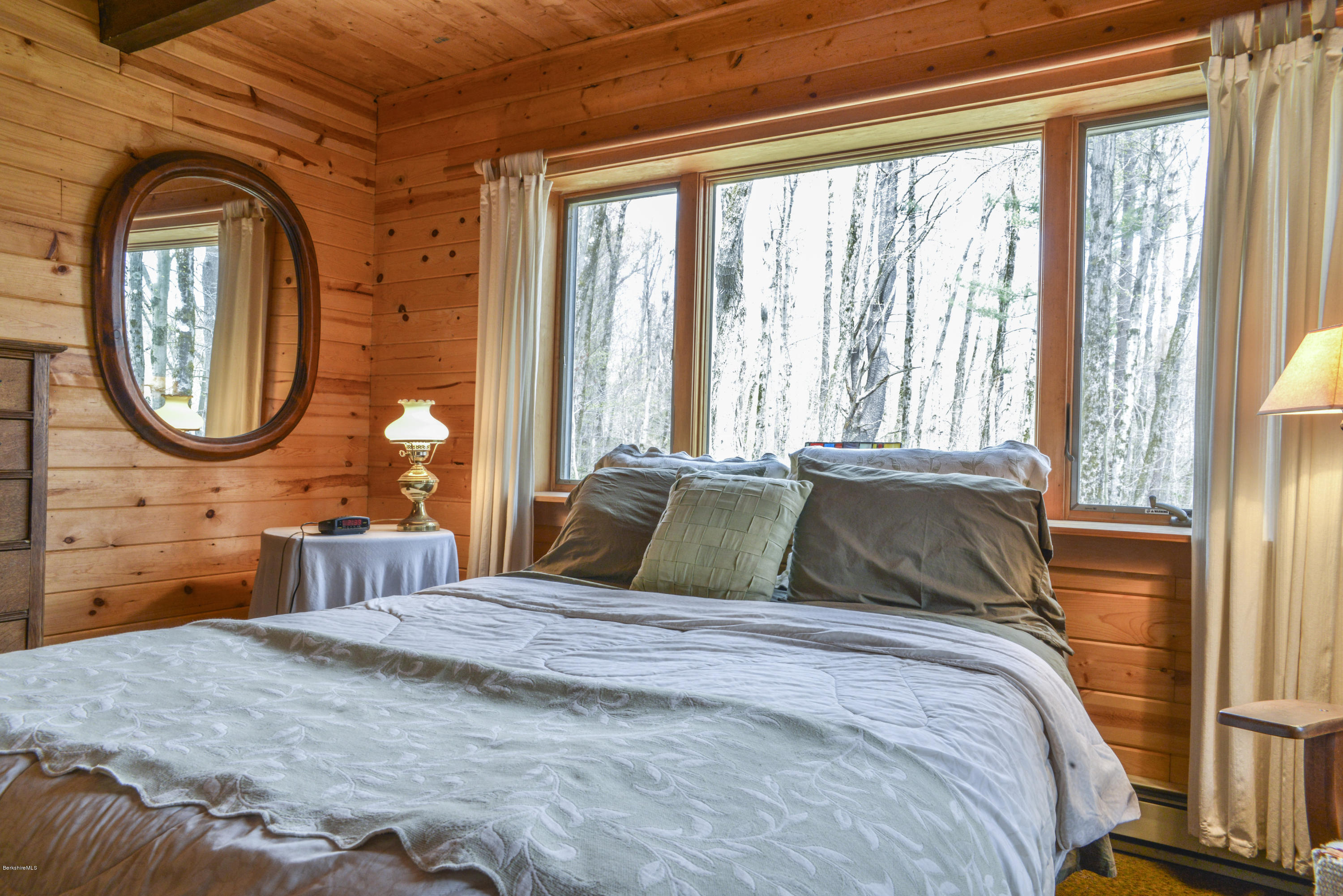43 Path Road Tolland, MA 01034 - Photo 15 of 35 a bedroom with a large bed and a large window
