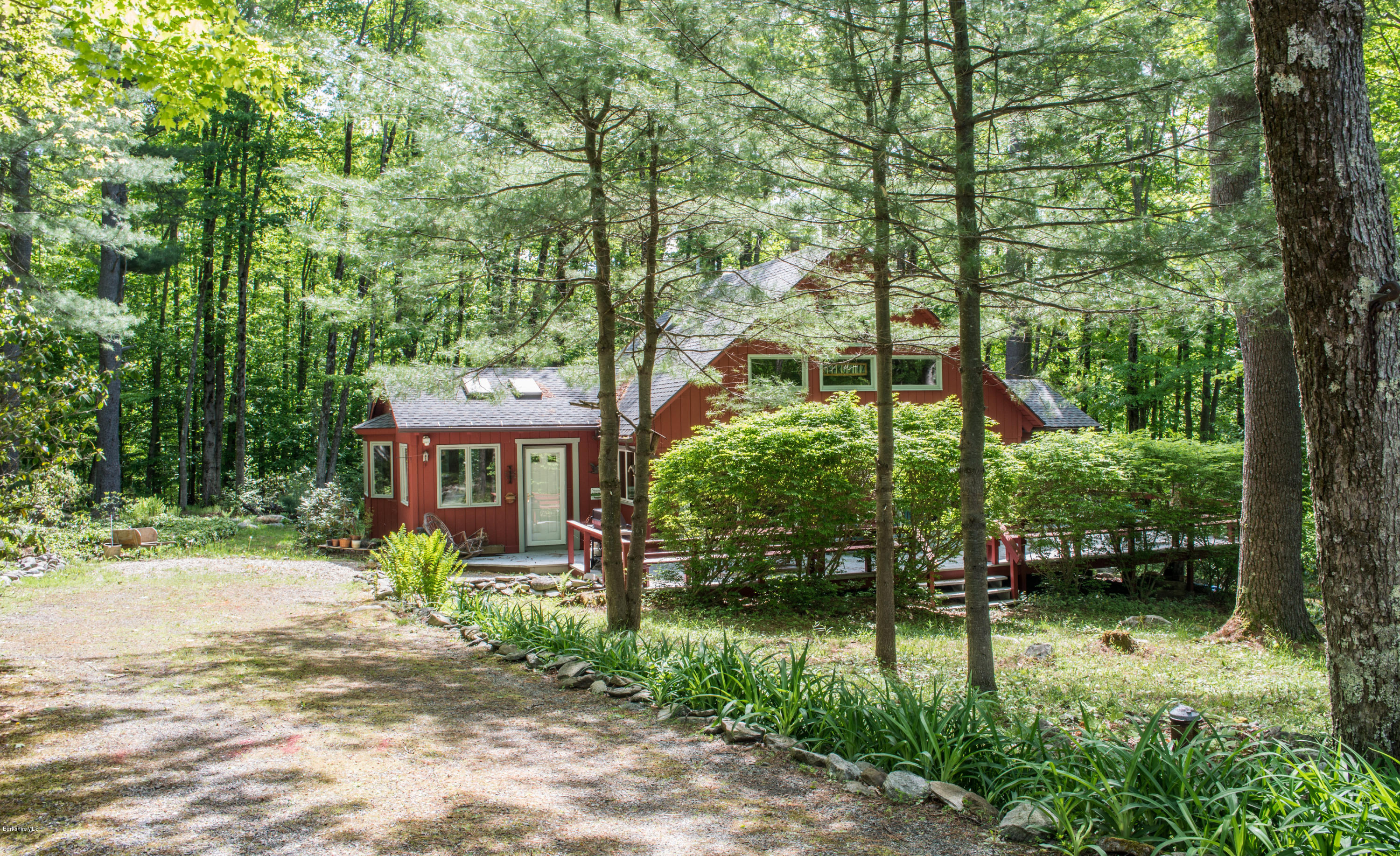 43 Path Road Tolland, MA 01034 - Photo 3 of 35 a front view of a house with garden