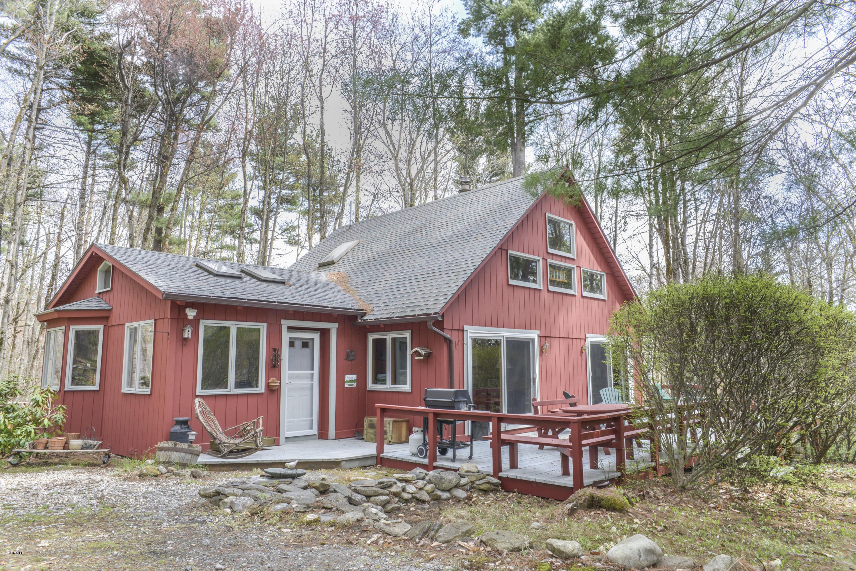 43 Path Road Tolland, MA 01034 - Photo 27 of 35 a front view of a house with garden and porch