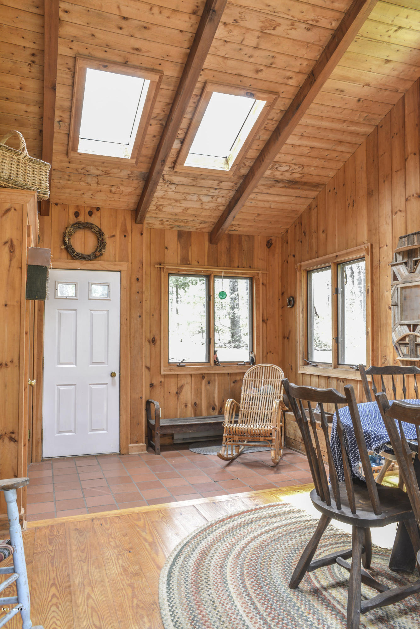 43 Path Road Tolland, MA 01034 - Photo 5 of 35 a spacious bedroom with a bed a couch and large windows