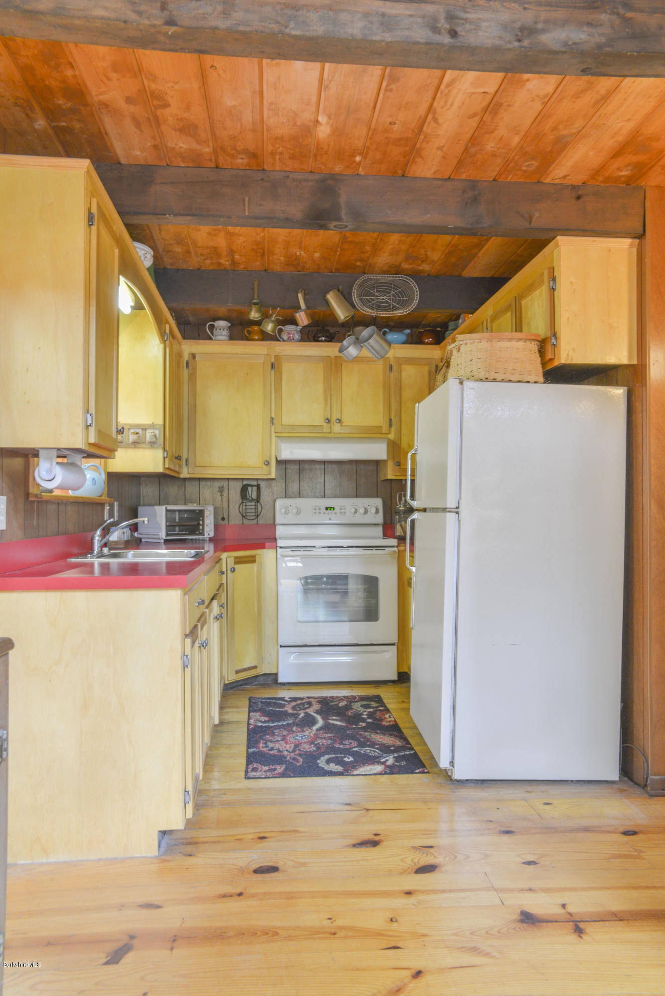 43 Path Road Tolland, MA 01034 - Photo 8 of 35 a view of walk in closet with open kitchen view