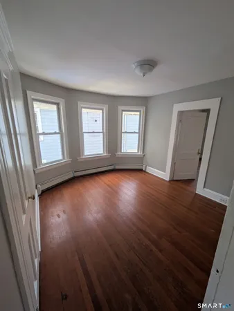 a view of livingroom with hardwood floor and window