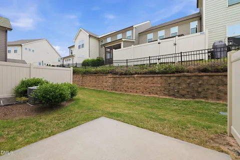 a view of a backyard of the house
