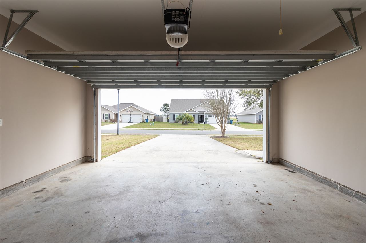 6883 Crimson Ridge Street Gulf Shores, AL 36542 - Photo 12 of 23 Garage