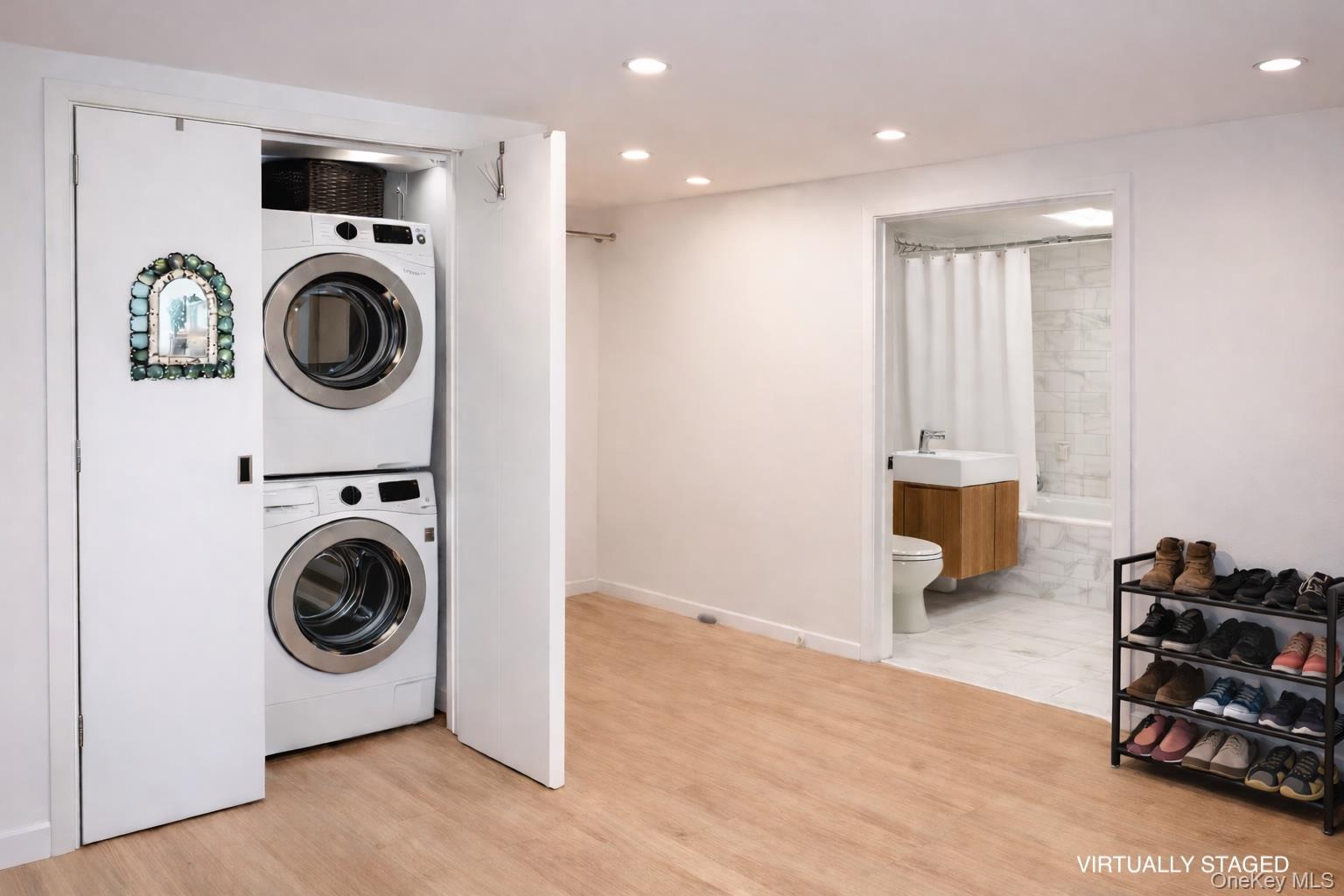 112-02 Northern Boulevard, Unit 2B Queens, NY 11368 - Photo 5 of 13 a utility room with sink dryer and washer