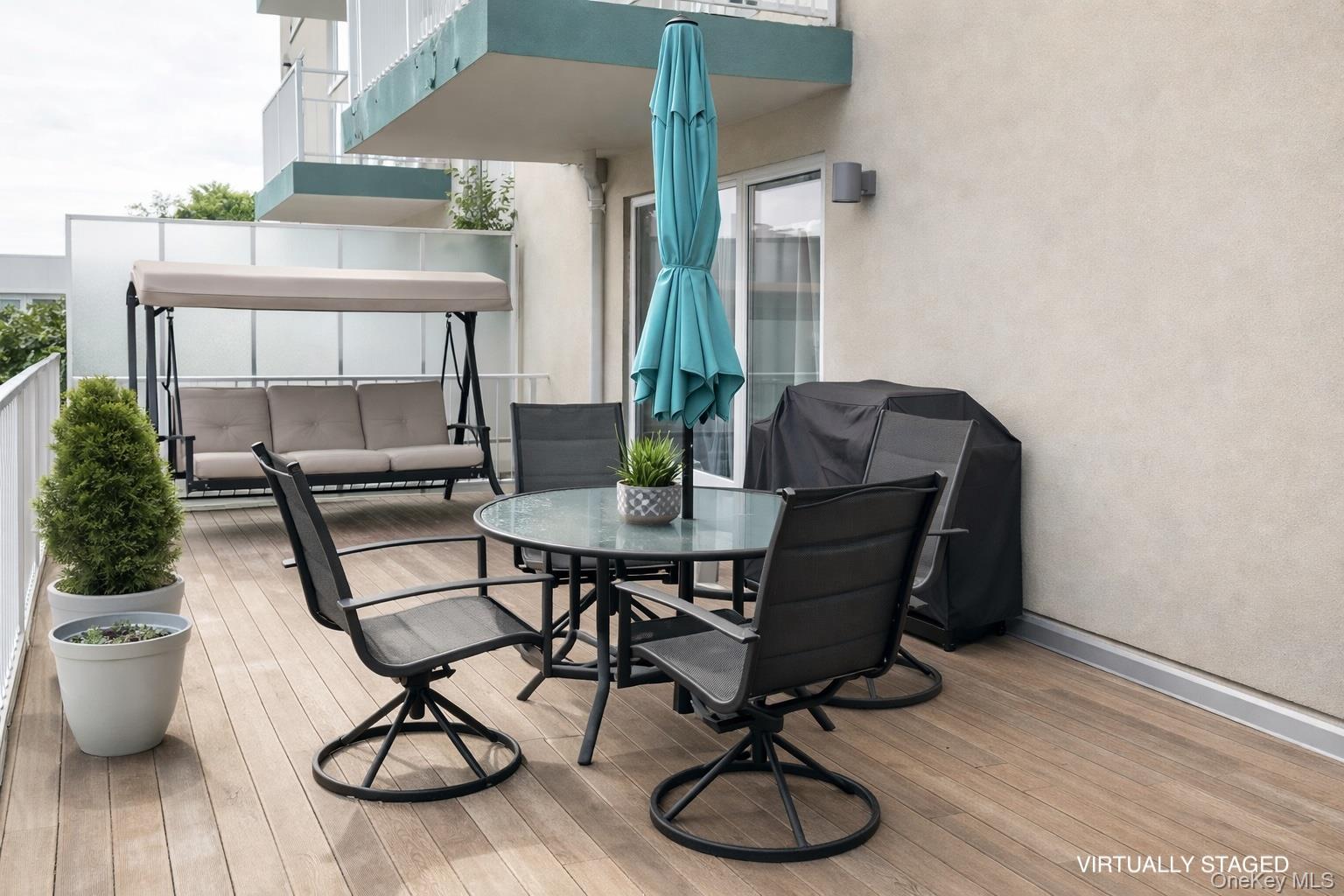 112-02 Northern Boulevard, Unit 2B Queens, NY 11368 - Photo 7 of 13 a view of a dining room with furniture window and wooden floor