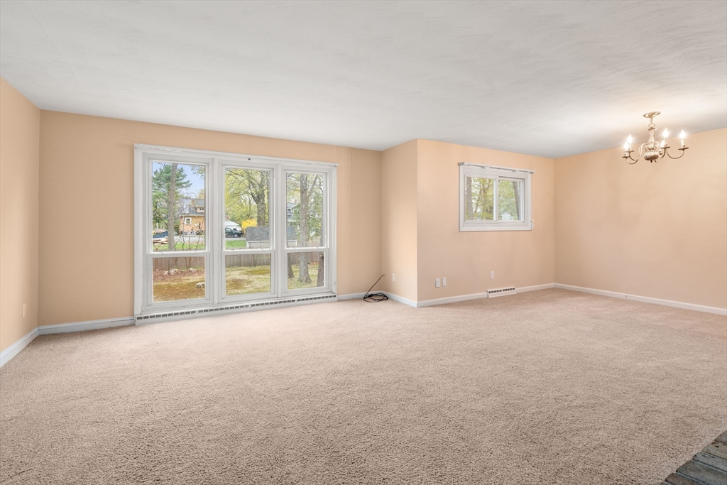 18 Royce Road Framingham, MA 01701 - Photo 3 of 30 an empty room with windows