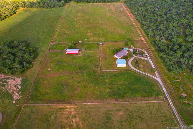a view of swimming pool with a yard