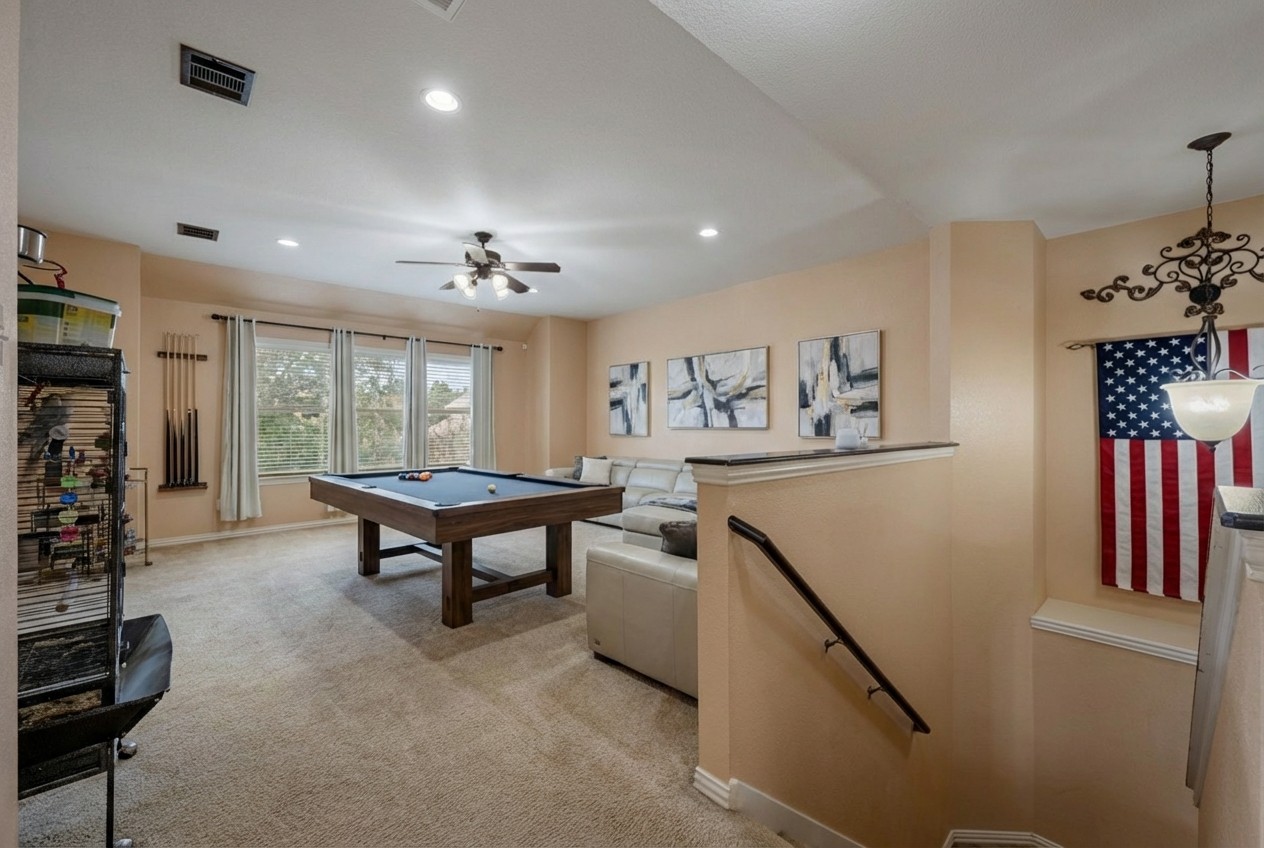2415 Elkhorn Ranch Road Leander, TX 78641 - Photo 13 of 39 a living room with furniture a dining table and a large window