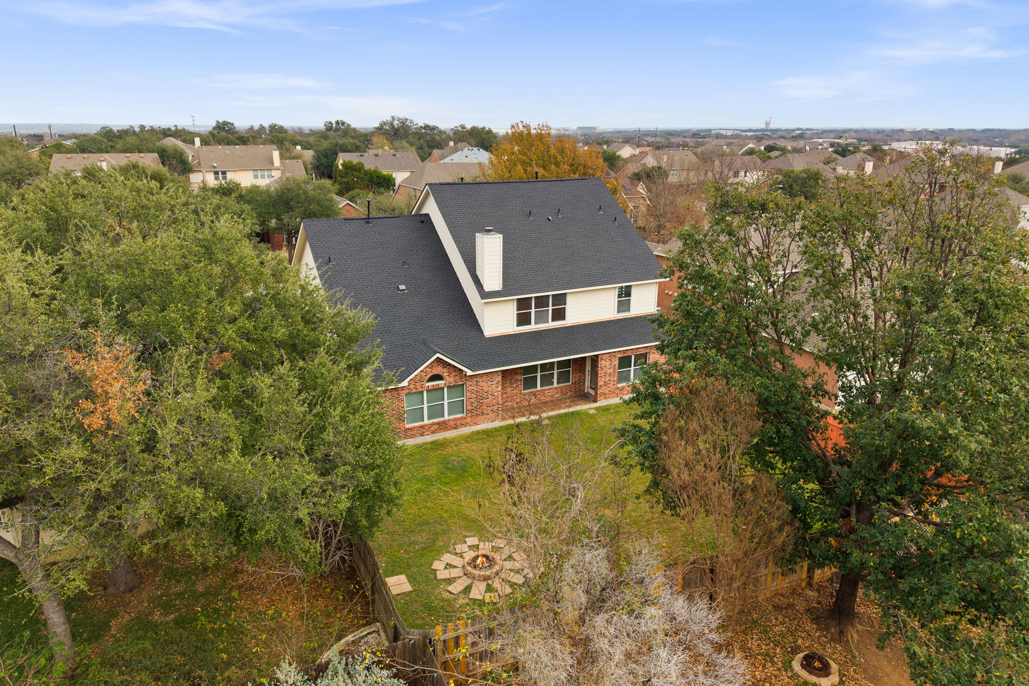 2415 Elkhorn Ranch Road Leander, TX 78641 - Photo 29 of 39 an aerial view of residential houses with outdoor space and trees