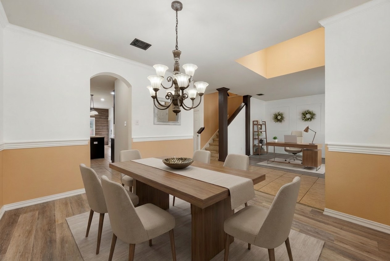 2415 Elkhorn Ranch Road Leander, TX 78641 - Photo 4 of 39 a view of a dining room with furniture and wooden floor