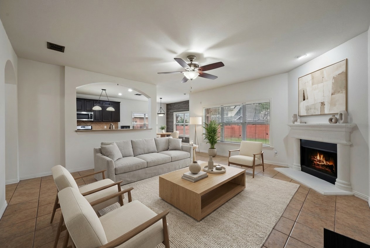 2415 Elkhorn Ranch Road Leander, TX 78641 - Photo 6 of 39 a living room with furniture and a fireplace