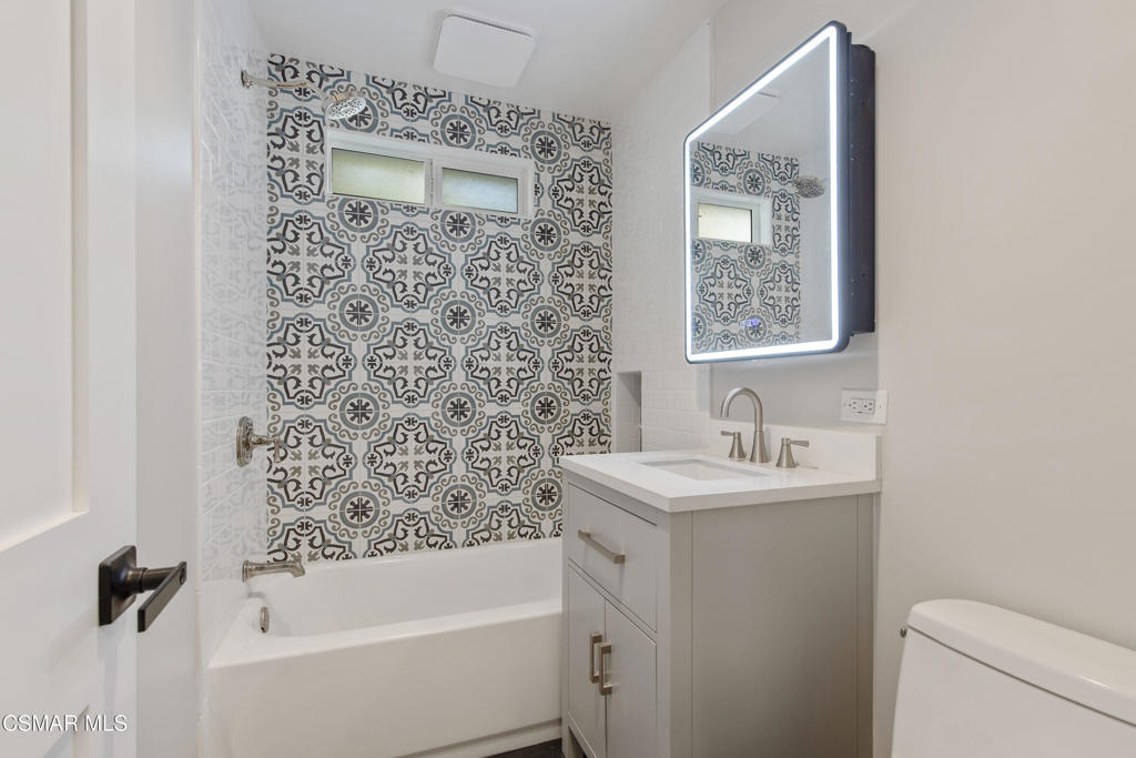 313 Raymond Street, Unit A Ojai, CA 93023 - Photo 11 of 32 a bathroom with a sink a toilet and shower