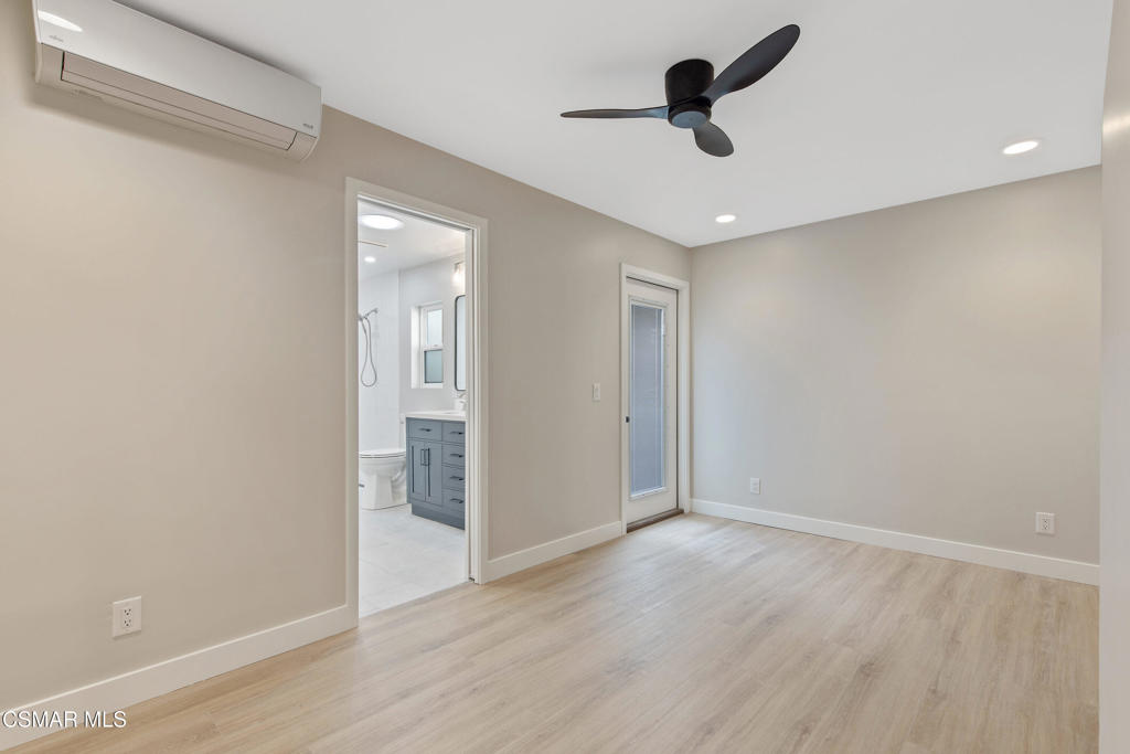 313 Raymond Street, Unit A Ojai, CA 93023 - Photo 12 of 32 wooden floor in an empty room with a window