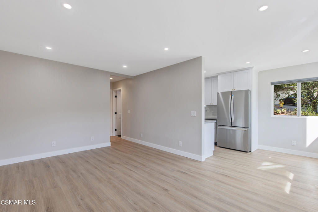 313 Raymond Street, Unit A Ojai, CA 93023 - Photo 4 of 32 a view of kitchen with refrigerator and wooden floor