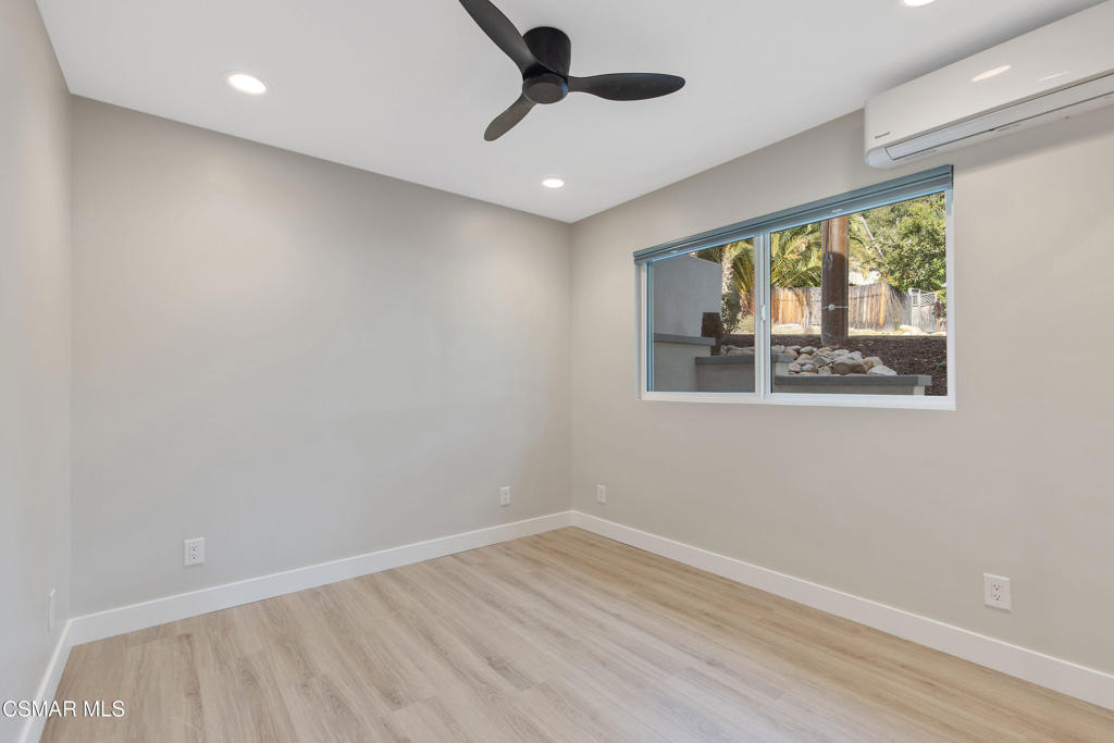 313 Raymond Street, Unit A Ojai, CA 93023 - Photo 10 of 32 wooden floor in an empty room with a window