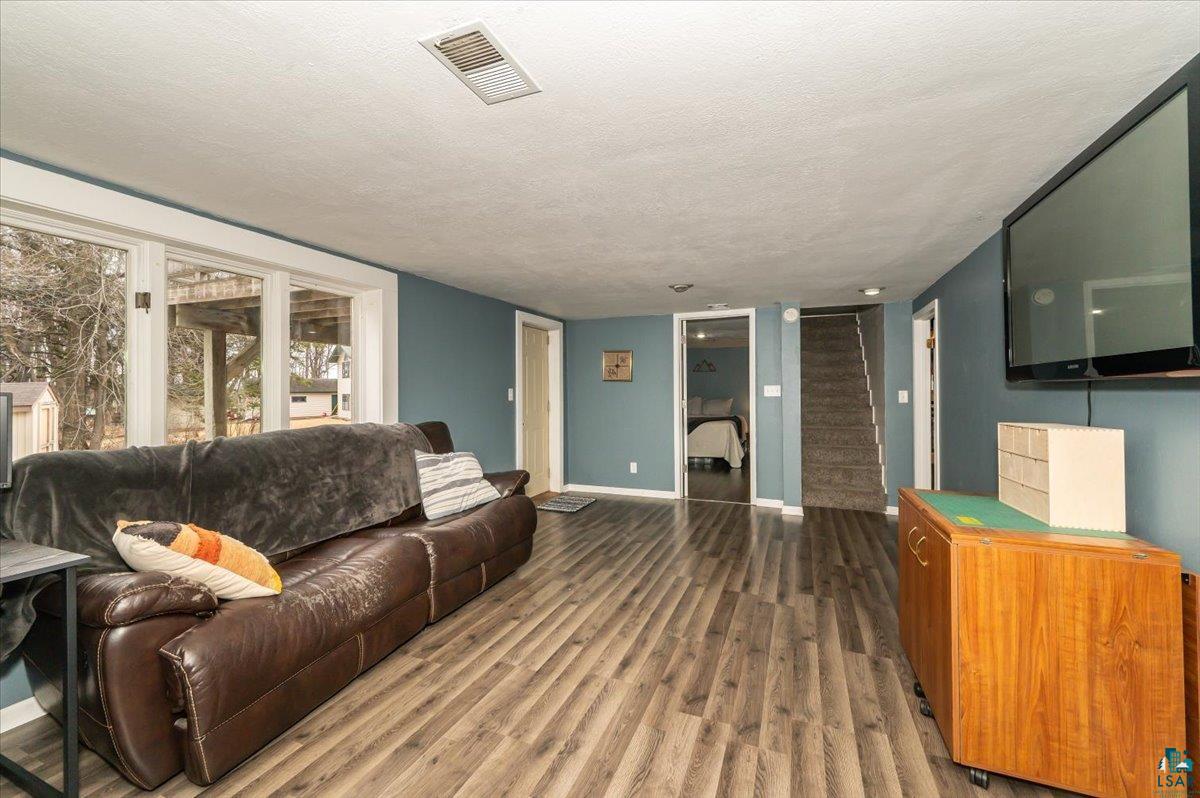 606 Maple Bend Drive Duluth, MN 55811 - Photo 11 of 30 Lower level family room with walk out to backyard