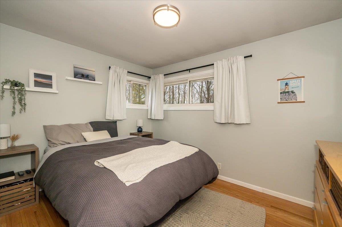 606 Maple Bend Drive Duluth, MN 55811 - Photo 14 of 30 Bedroom with wood finished floors