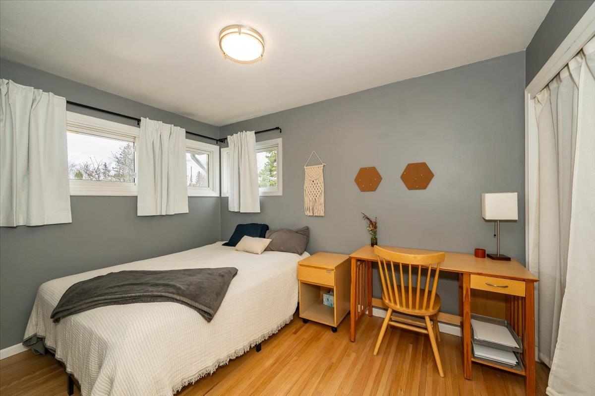606 Maple Bend Drive Duluth, MN 55811 - Photo 16 of 30 Bedroom with wood finished floors