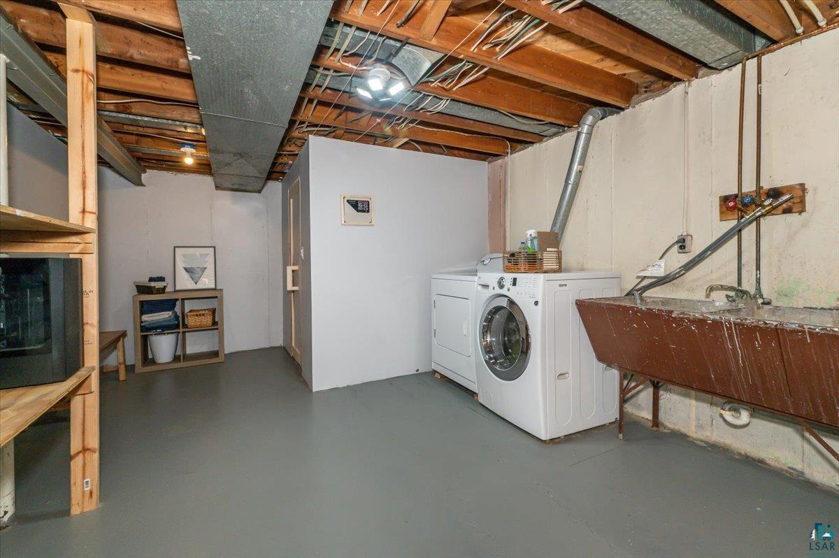 606 Maple Bend Drive Duluth, MN 55811 - Photo 21 of 30 Storage area featuring separate washer and dryer and laundry area