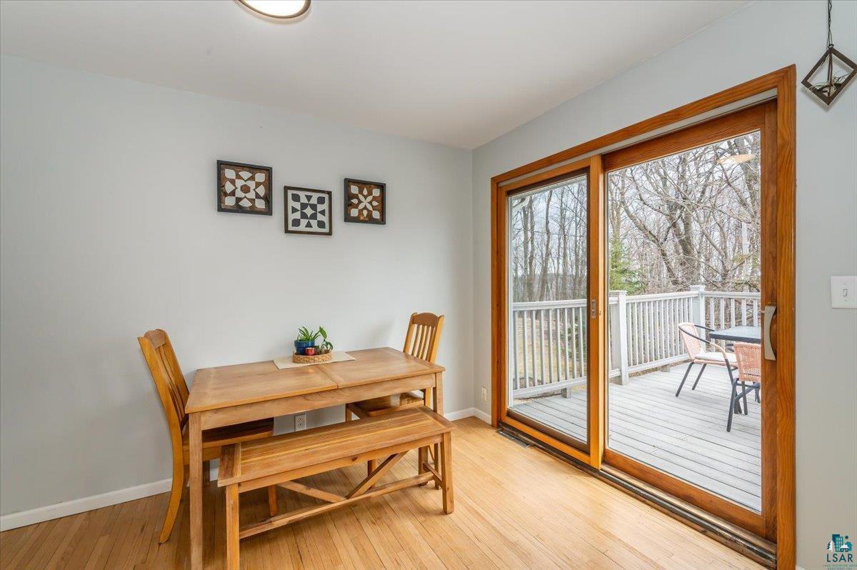 606 Maple Bend Drive Duluth, MN 55811 - Photo 10 of 30 Dining room featuring light wood finished floors