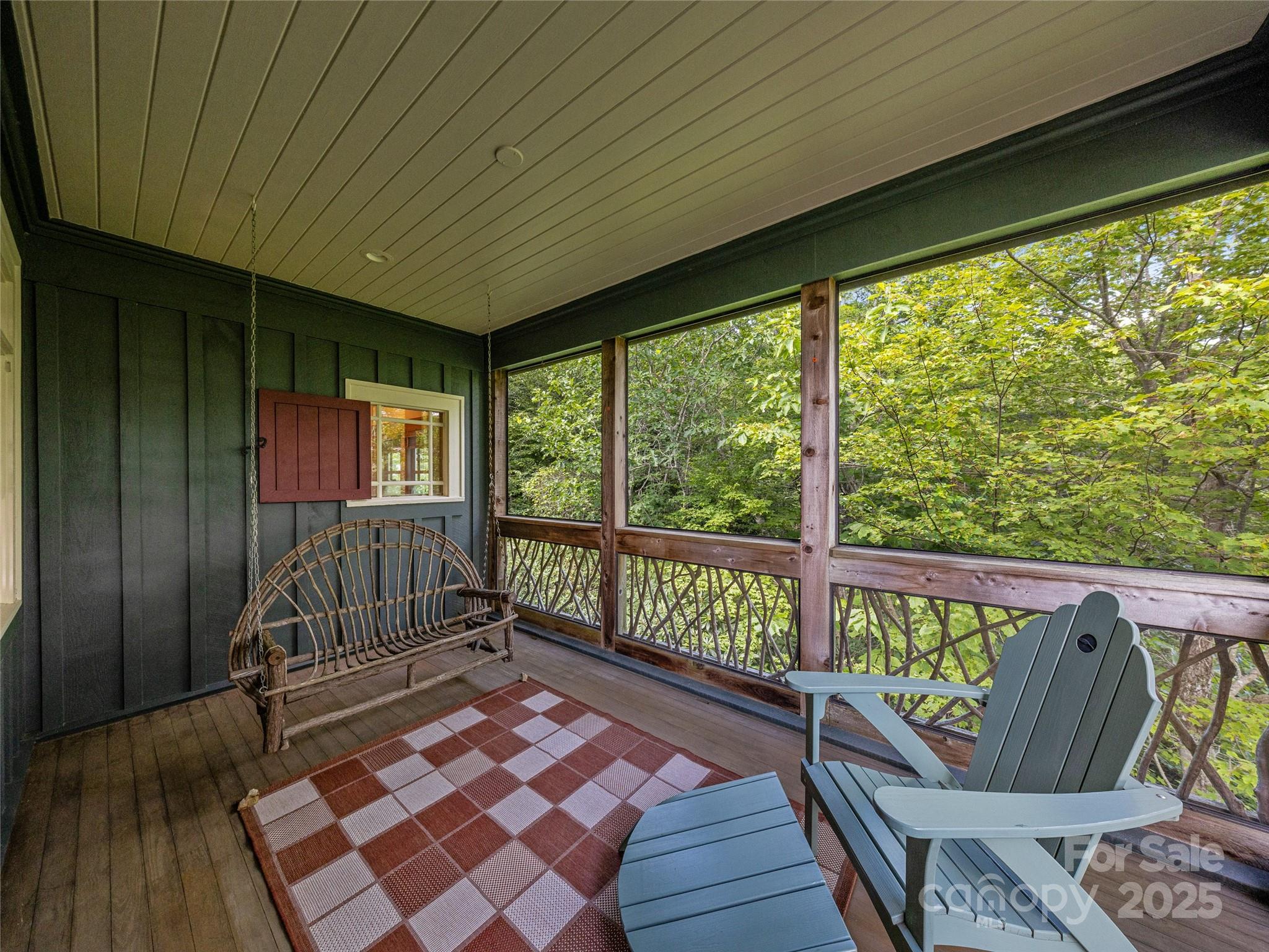 770 Mdw Rdg Drive Lake Toxaway, NC 28747 - Photo 23 of 48 a view of a two chairs in the balcony