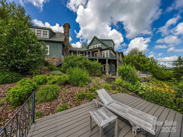 a view of an empty room with a fireplace