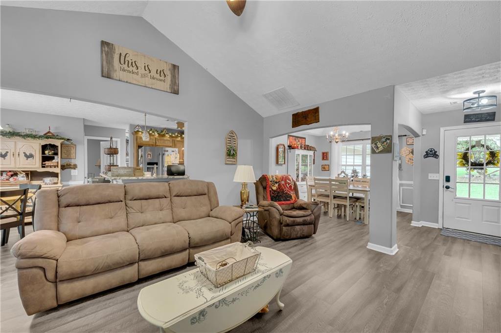 587-j B J B Owens Road Bethlehem, GA 30620 - Photo 27 of 99 a living room with furniture and a wooden floor