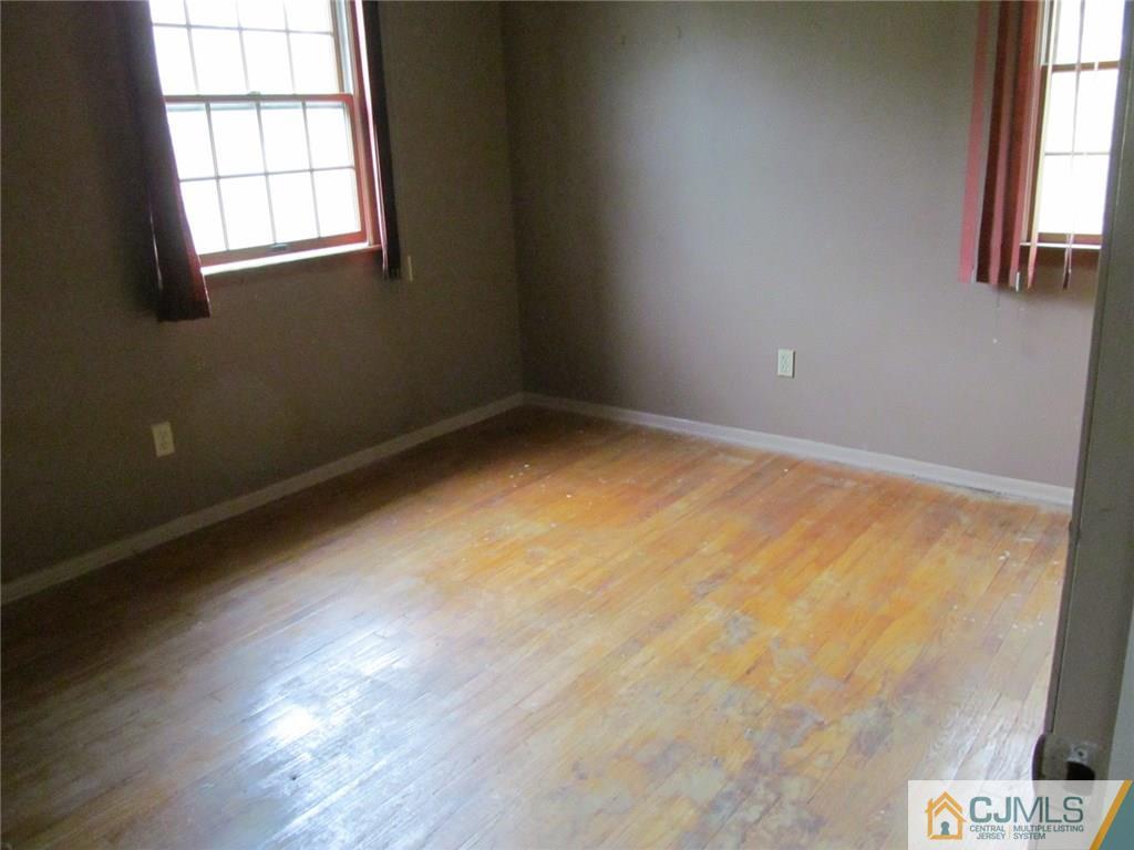 12 Kings Road East Brunswick, NJ 08816 - Photo 13 of 24 an empty room with windows