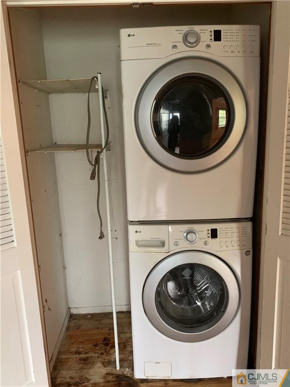 12 Kings Road East Brunswick, NJ 08816 - Photo 19 of 24 a utility room with dryer and washer