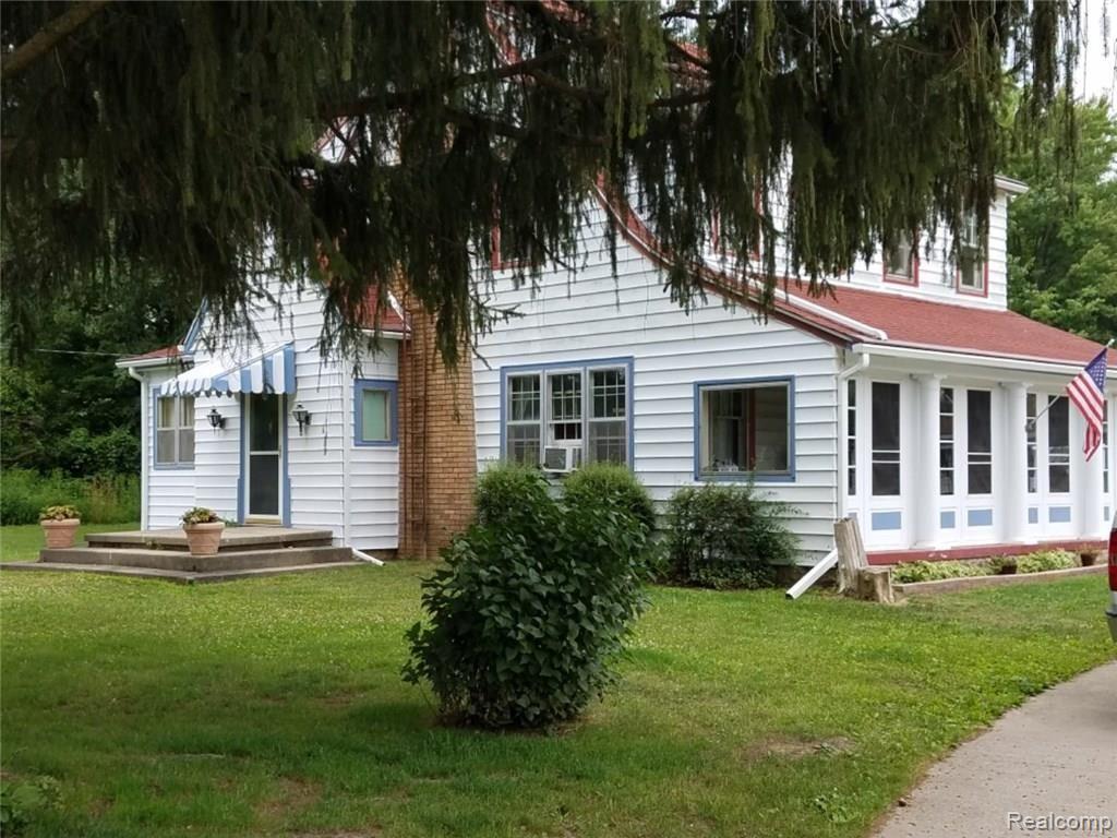 9480 West Grand River Avenue Fowlerville, MI 48836 - Photo 1 of 12 9480 Grand River Front.jpg
